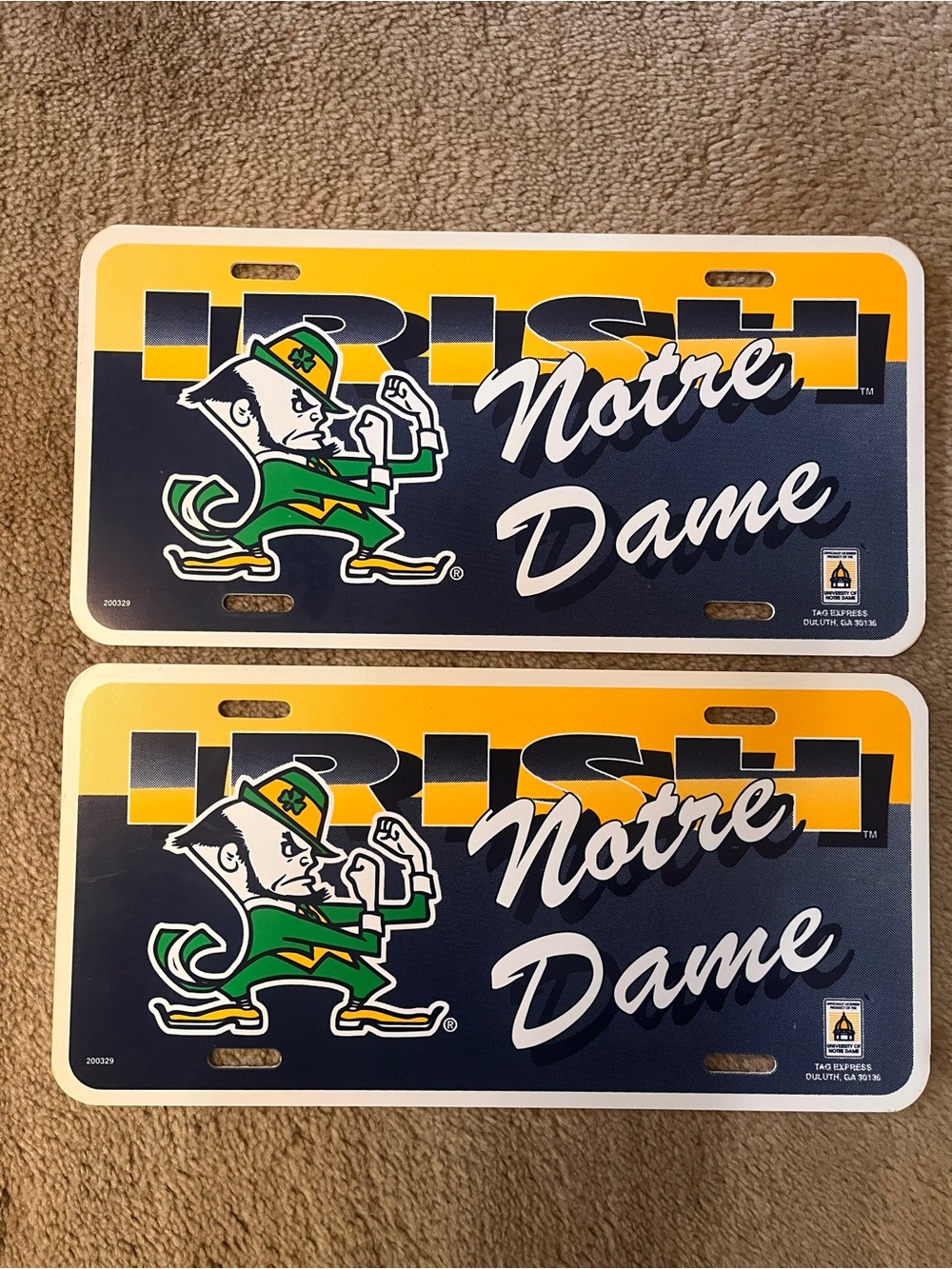 Two Notre Dame Vintage Booster / License Plates